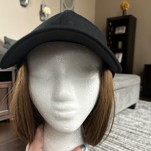 Wig framed baseball cap